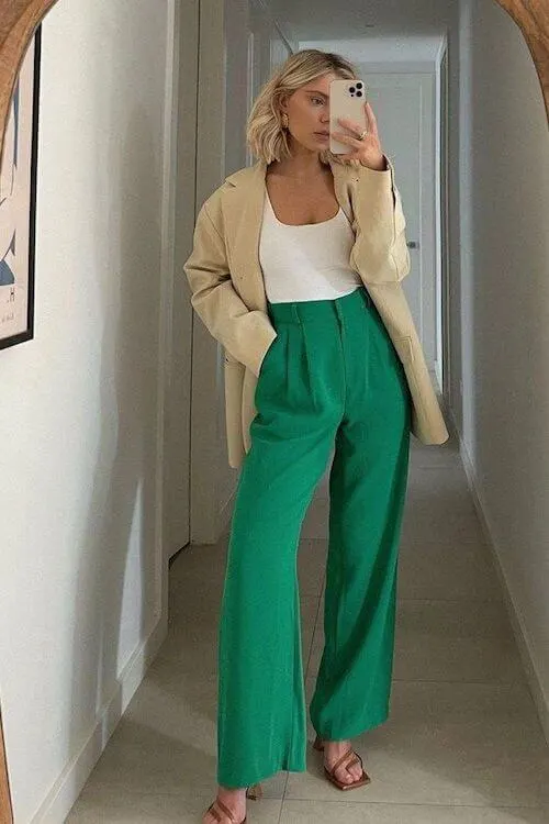 Green pants with a beige blazer