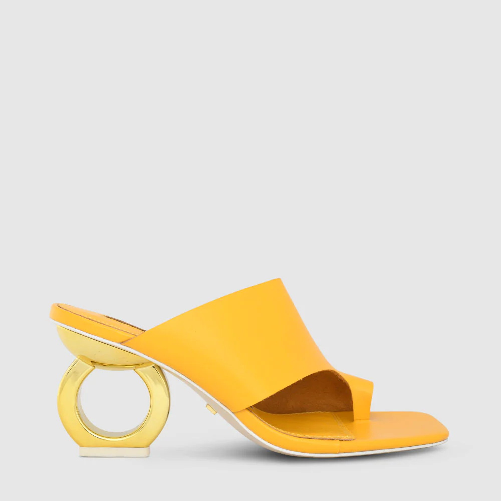 Yellow sculptural sandals