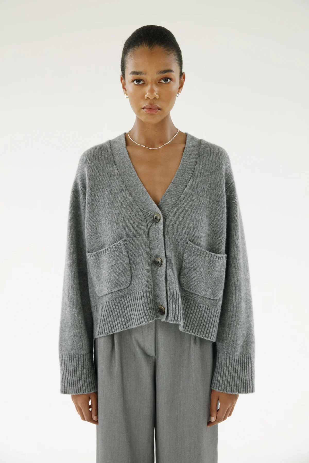 Grey Almada Label cardigan.