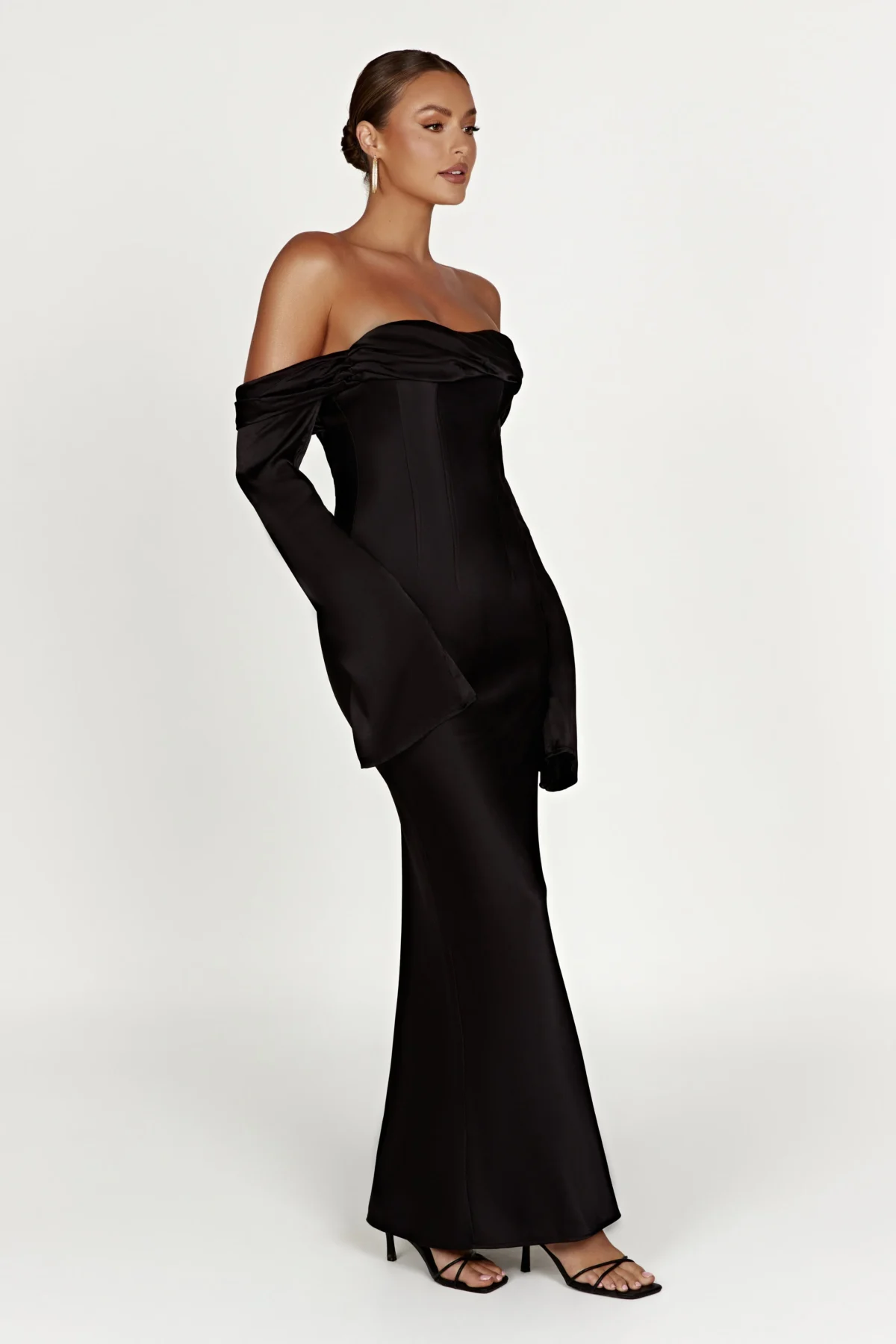 Black off shoulder wedding guest dress.
