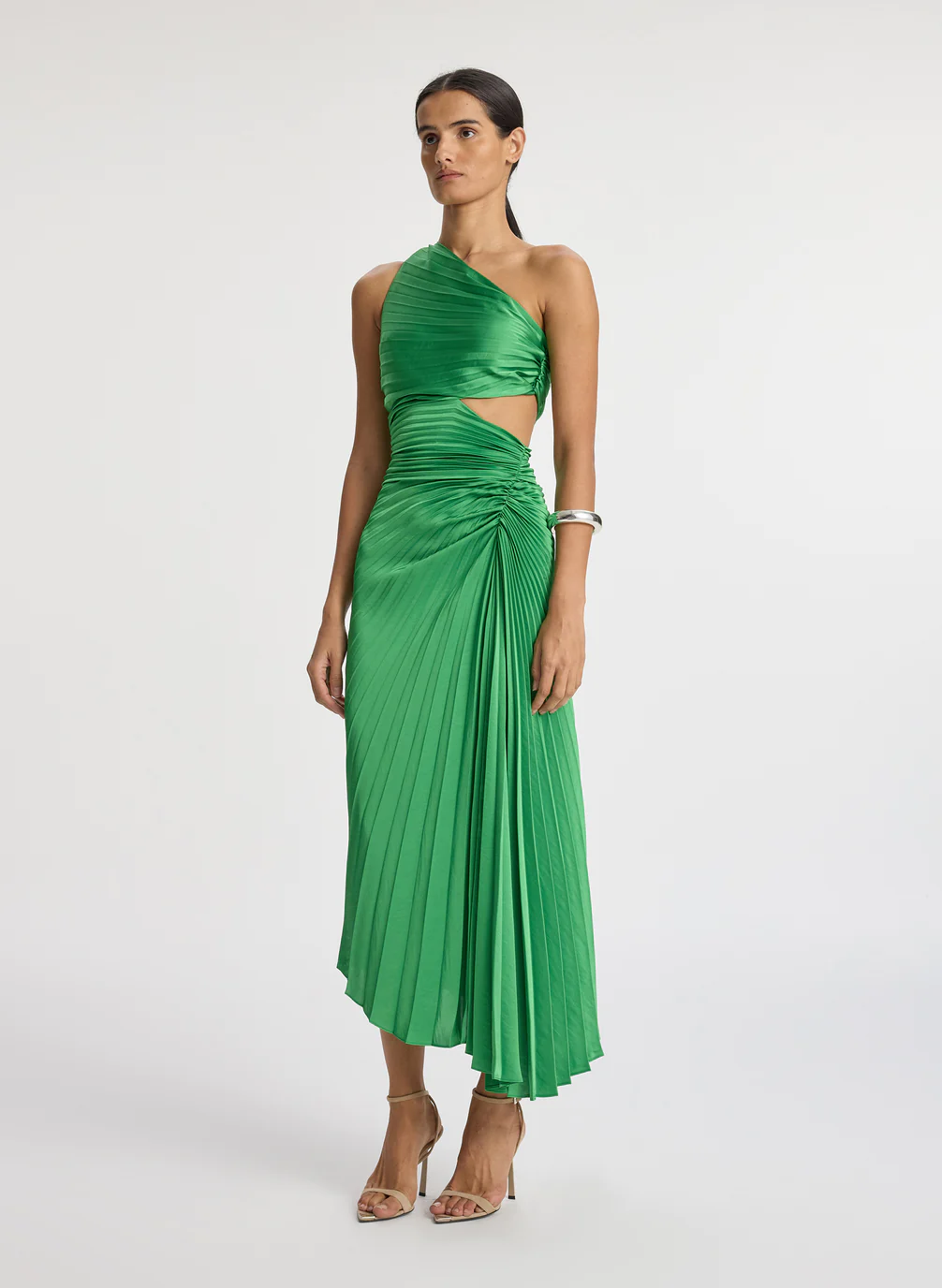 Green pleated wedding guest dress.