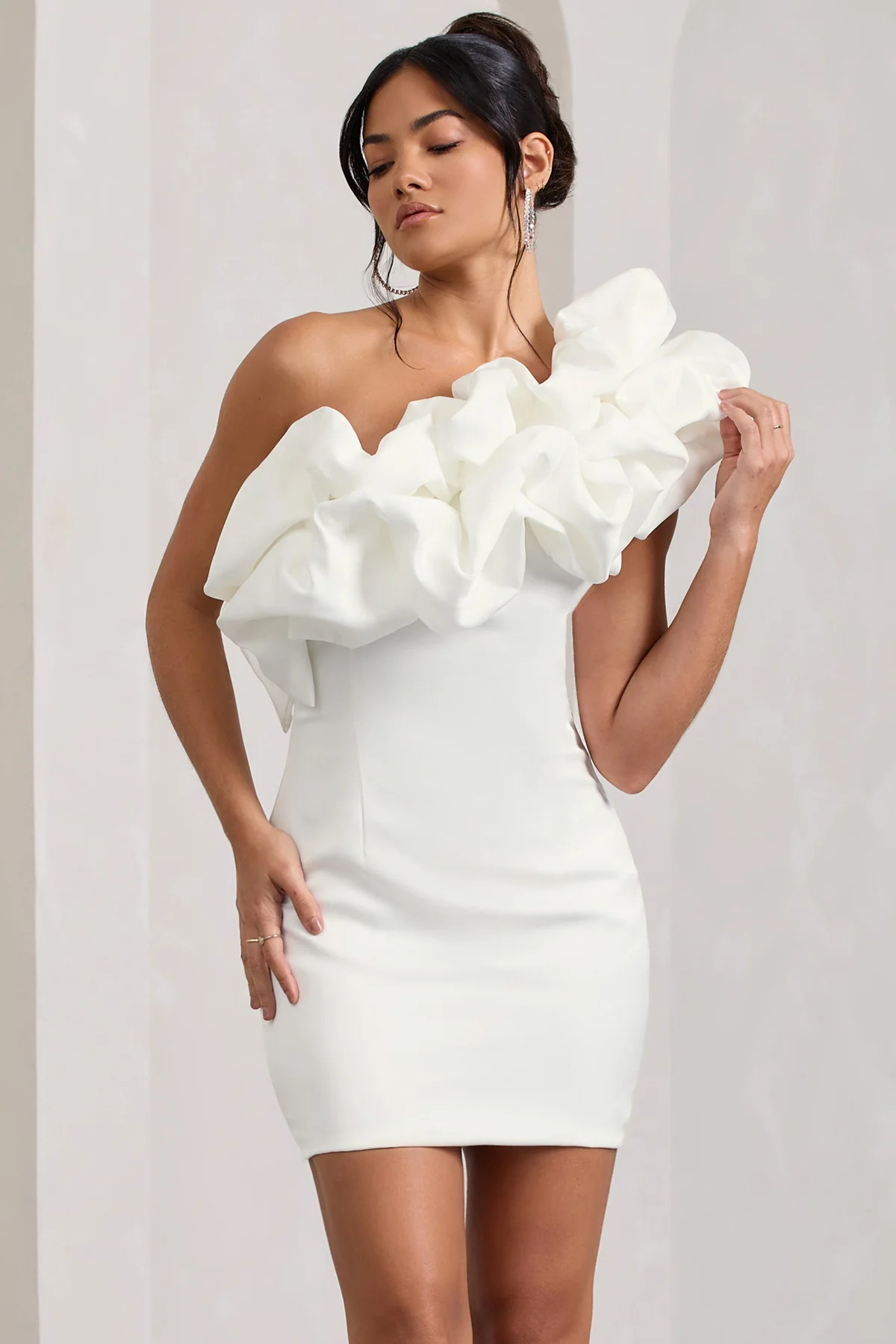 Chic white graduation dress with a voluminous frill details.