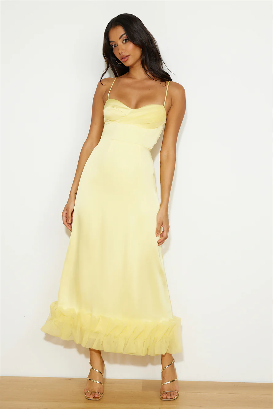 Light yellow wedding guest dress.