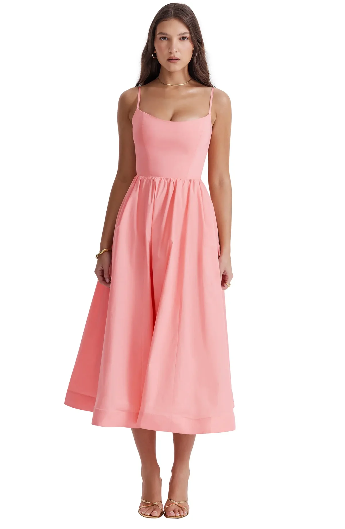 Peach colored A-line long wedding guest dress.
