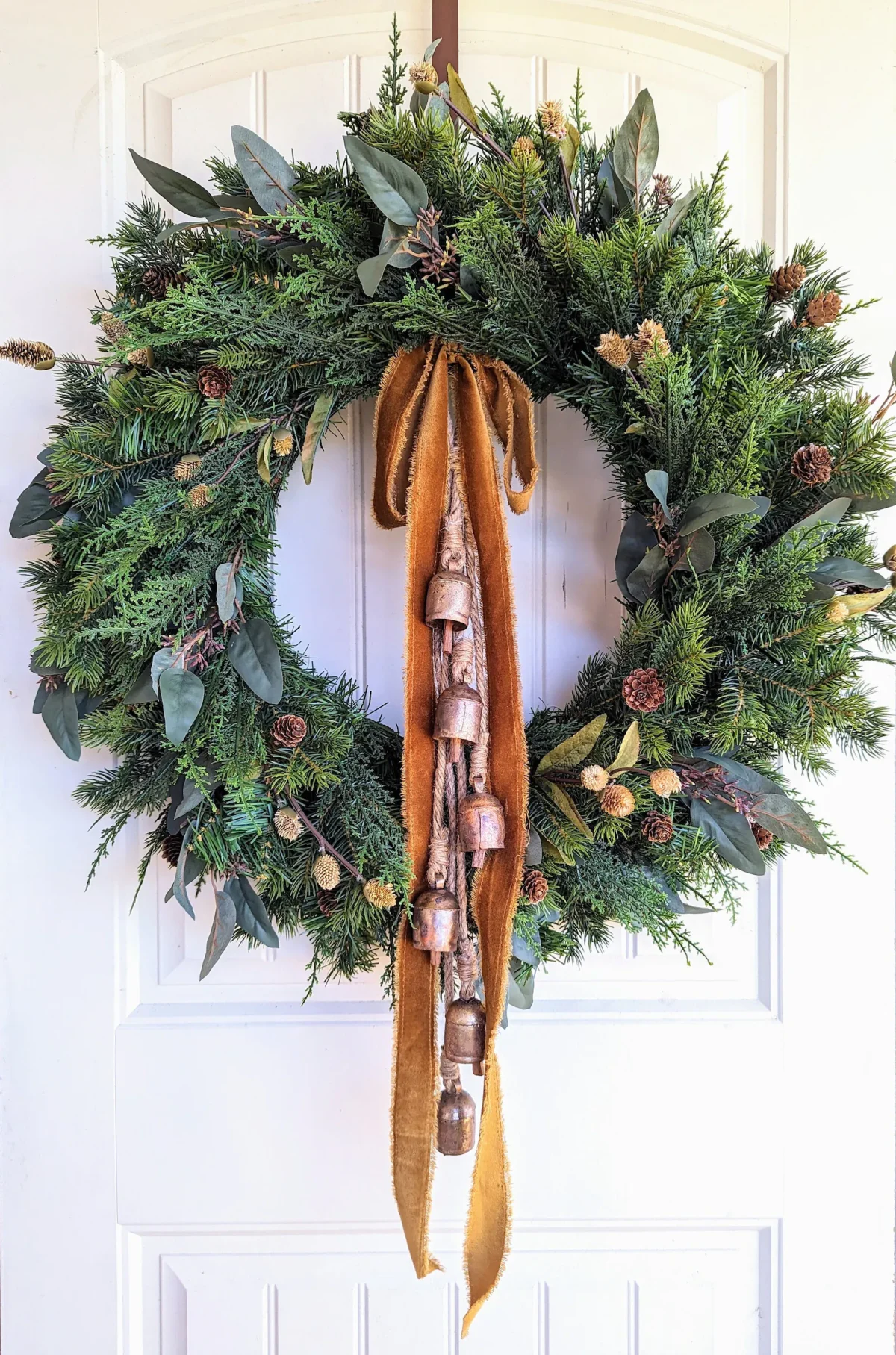 Evergreen wreath with Gold Bells With Velvet Ribbon.